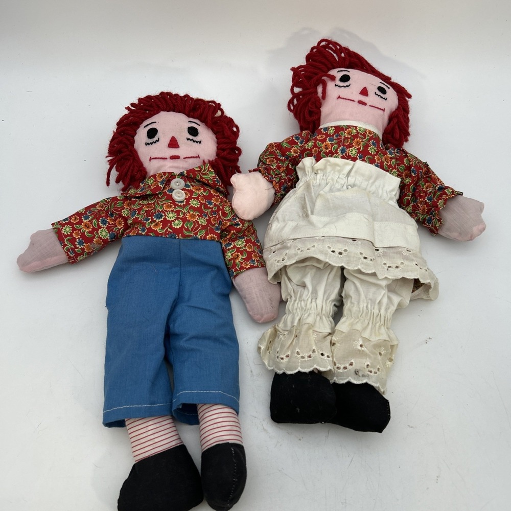 pair of vintage-style, handmade Raggedy Ann and Andy cloth dolls